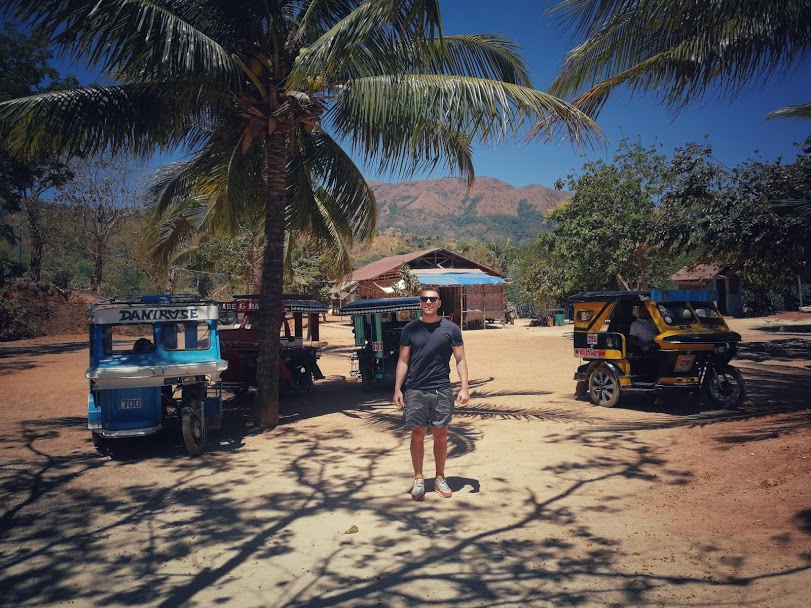 Foto Tricycle op strand